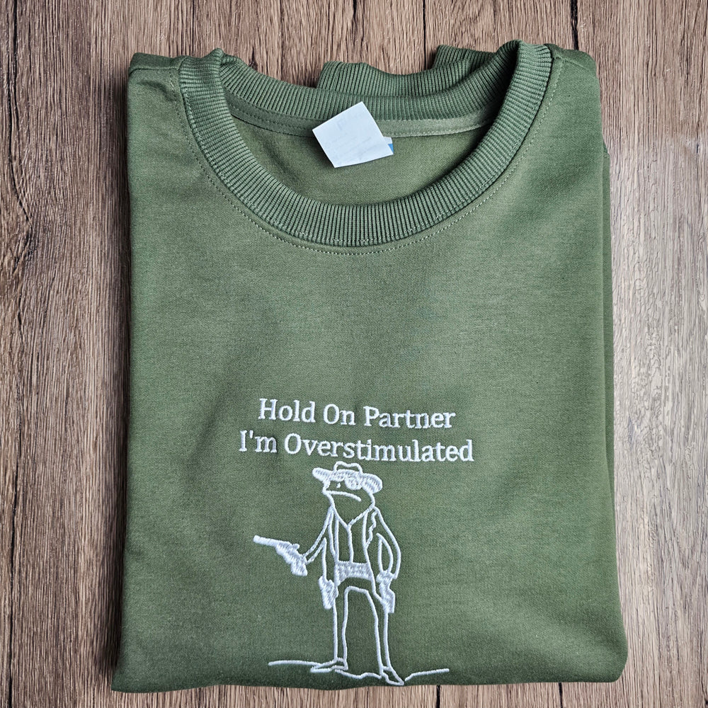 Hold On Partner I’m Overstimulated Embroidered Sweatshirt
