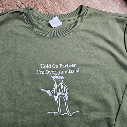 Hold On Partner I’m Overstimulated Embroidered Sweatshirt